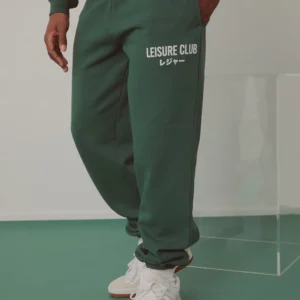 BAGGY LEISURE CLUB CUFFED TRACK PANTS IN GREEN